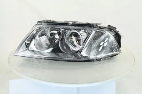 Фара лев. VW PASSAT B5 00-05 (выр-во) TYC 20-6244-05-2B